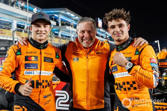 Oscar Piastri, McLaren F1 Team, 1st position, Zak Brown, CEO, McLaren Racing, and Lando Norris, McLaren F1 Team, 2nd position, celebrate after the Sprint