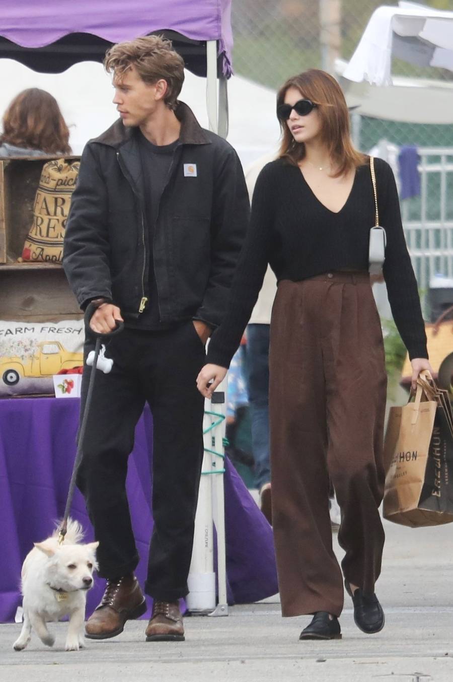 Kaia Gerber wearing Reformation Mason trousers