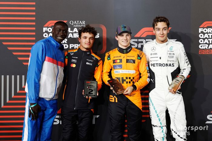 Khaby Lame, Oscar Piastri, McLaren F1 Team, 1st position, Lando Norris, McLaren F1 Team, 2nd position, George Russell, Mercedes-AMG F1 Team, 3rd position