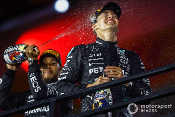 Lewis Hamilton, Mercedes-AMG F1 Team, 2nd position, sprays George Russell, Mercedes-AMG F1 Team, 1st position, with Champagne