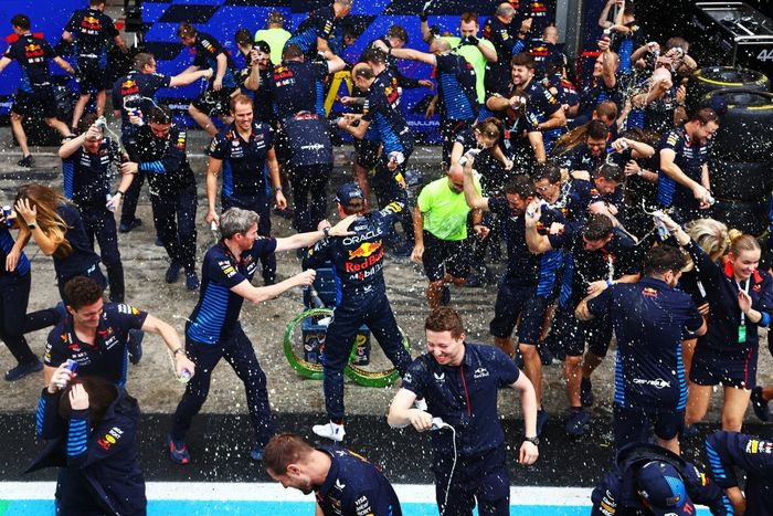 Max Verstappen, Red Bull Racing celebrates with team members