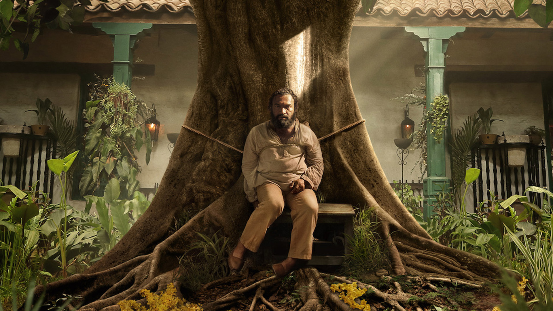 Claudio Cataño tied to a tree for a new show poster on Netflix