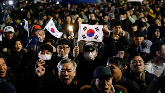 People gather outside the National Assembly, after South Korean President Yoon Suk Yeol declared martial law, in Seoul, South Korea, December 4, 2024.(Reuters)