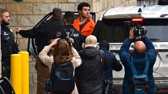 Suspect Luigi Mangione is taken into the Blair County Courthouse on Tuesday, Dec. 10, 2024, in Hollidaysburg, Pa. (Janet Klingbeil via AP)(AP)