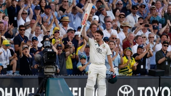 Australia's Travis Head acknowledges the applause from the crowd as he leaves the field. (AP Photo/James Elsby)(AP)