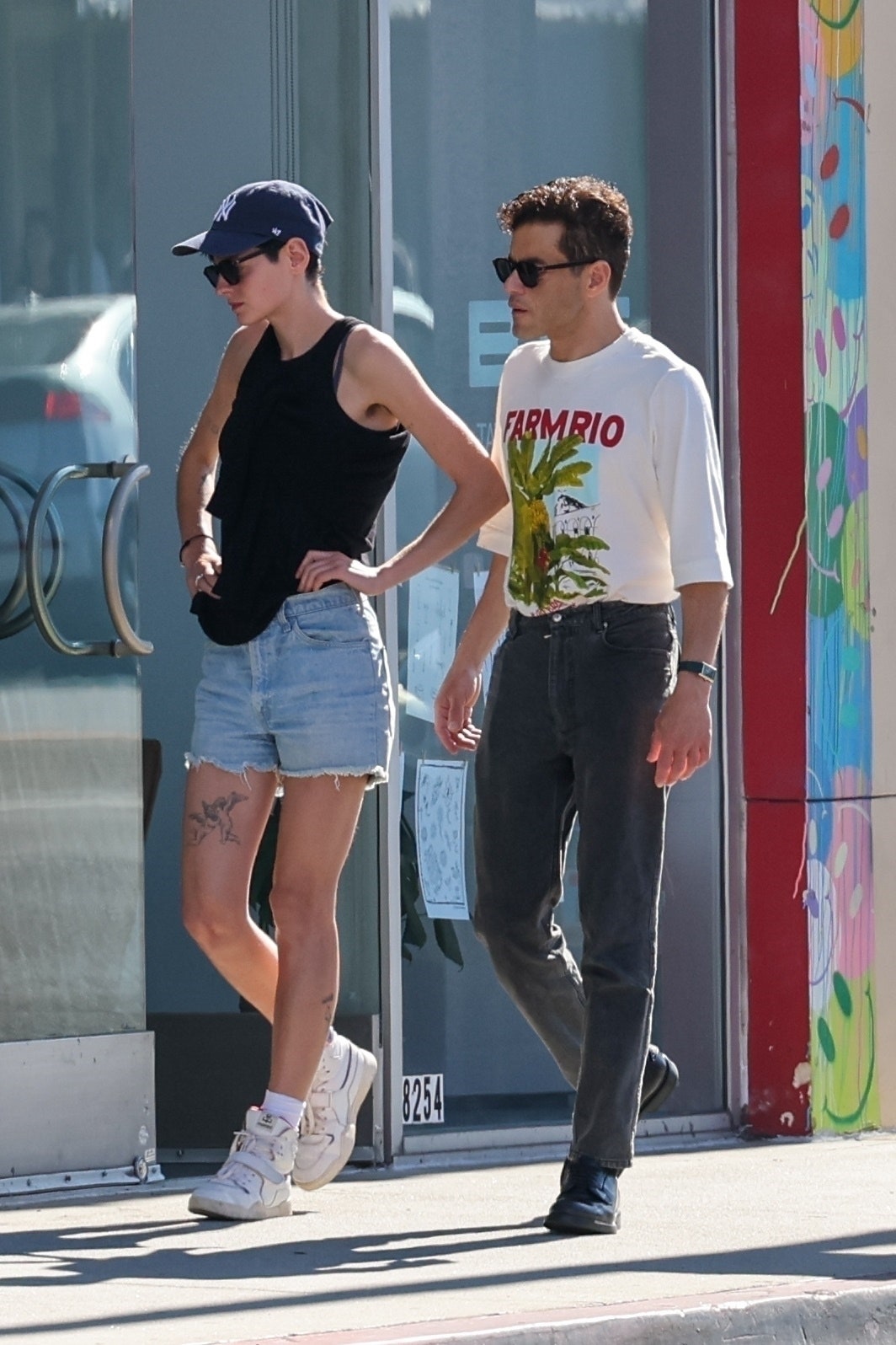 West Hollywood CA  EXCLUSIVE  Hollywood lovebirds and clone couple Rami Malek and girlfriend Emma Corrin get quite cozy...