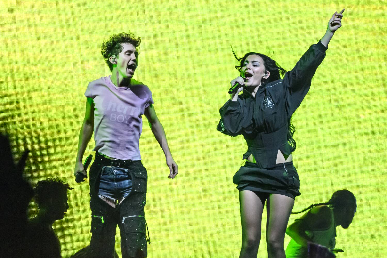 Charli XCX joins Troye Sivan on stage during the Something to Give Each Other Tour at OVO Arena Wembley