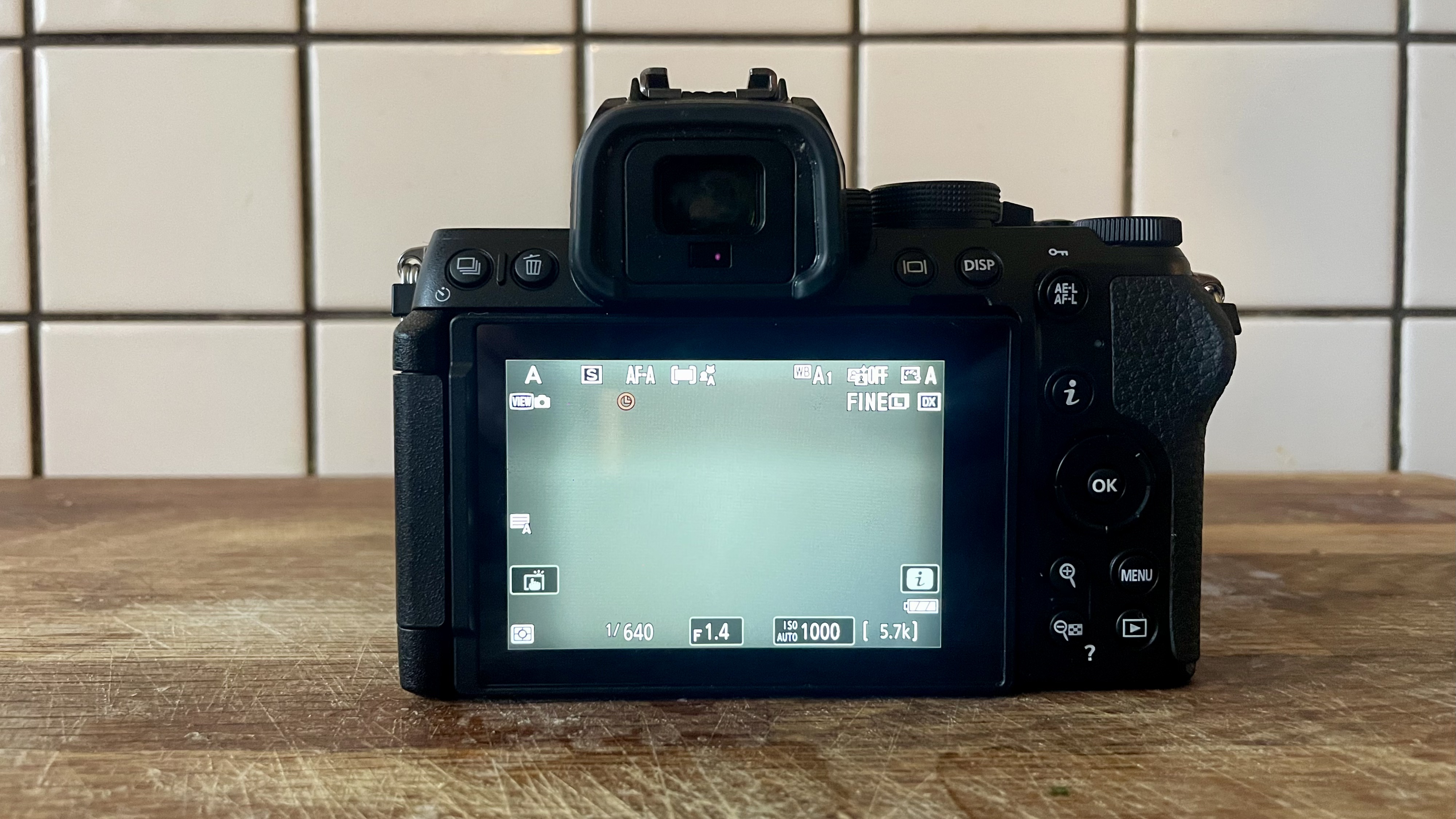 Nikon Z50 II mirrorless camera on a wooden tabletop