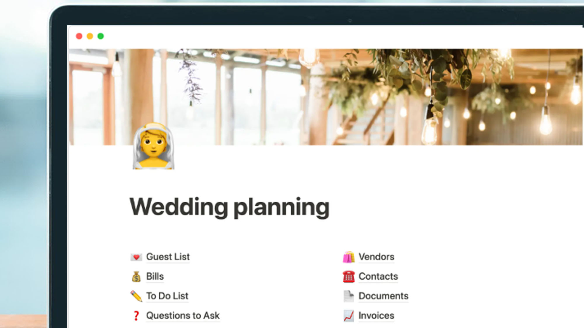 A laptop screen showing a wedding planner in Notion