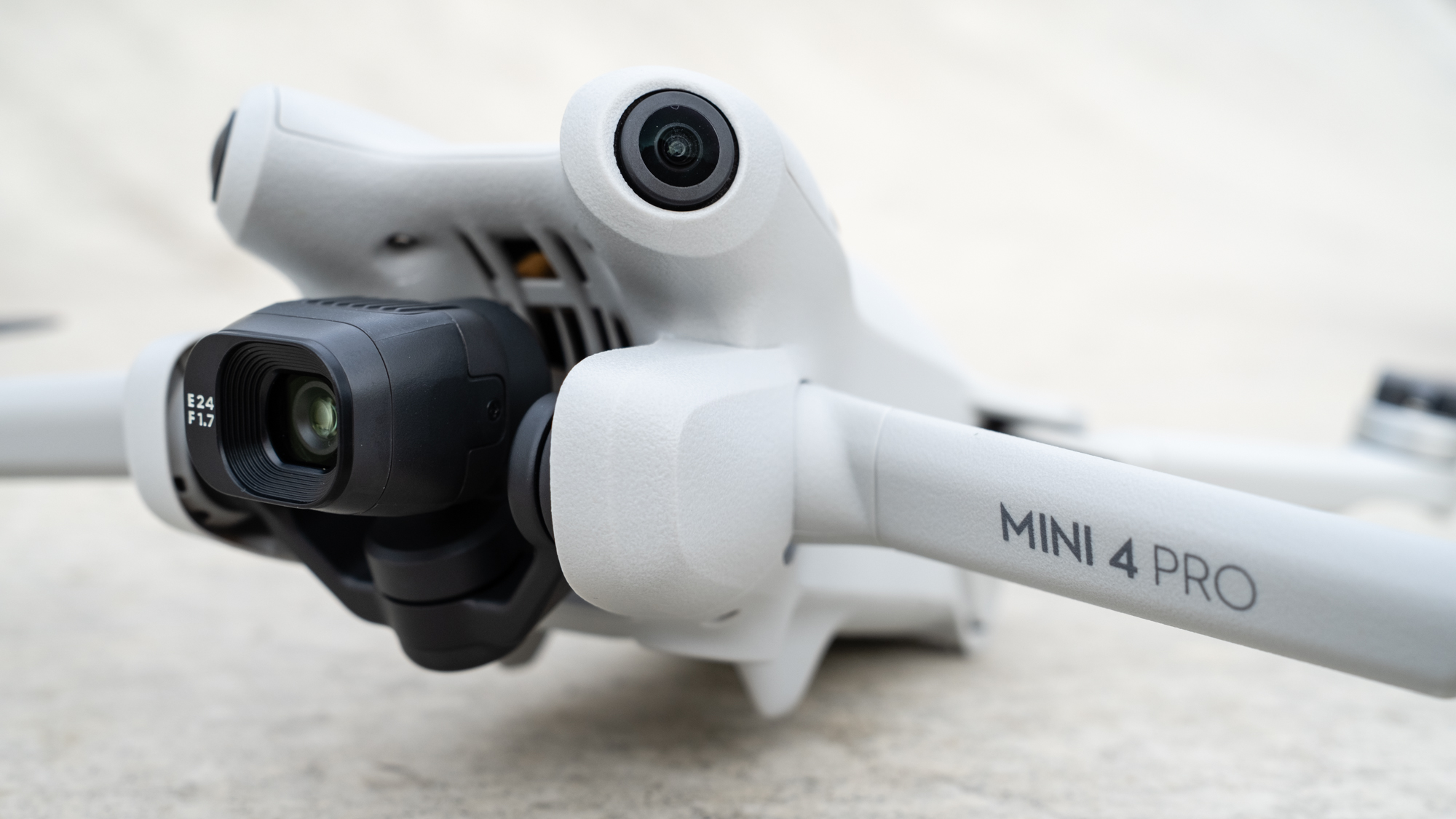 DJI Mini 4 Pro close up of camera and propeller arm