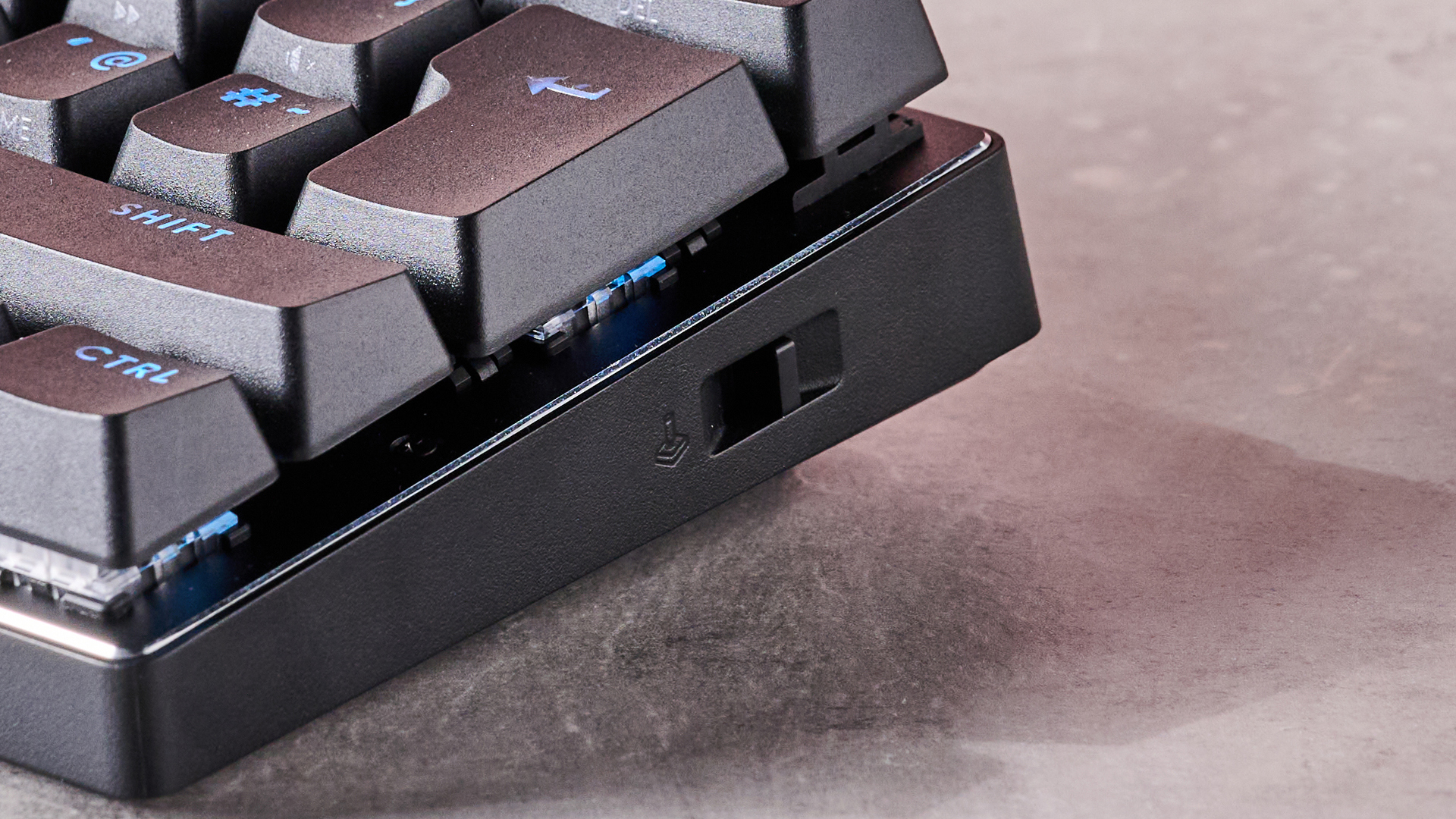 Close-up of Game Mode button on side of Logitech Pro X 60